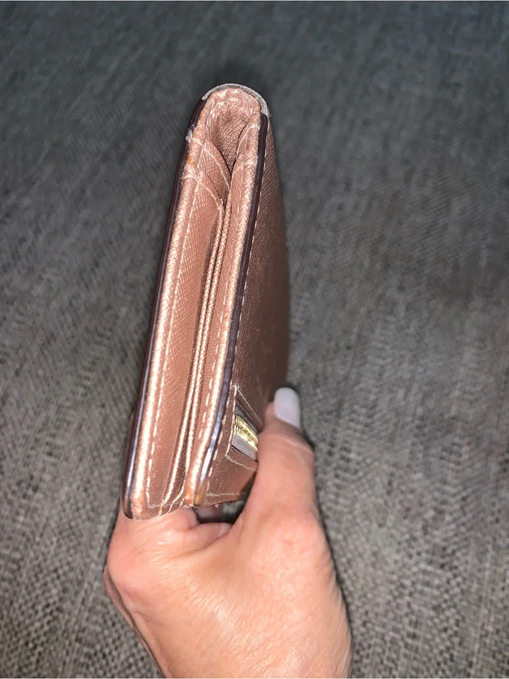 Kate Spade rose gold wallet with callouts